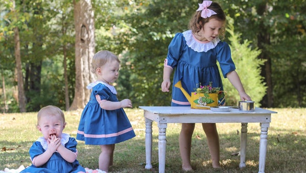 Owned and operated by three sisters-in-law, Wind Charmer clothing carries dresses for girls ages 12 months old to six years old. (Contributed)