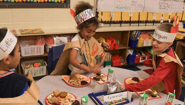 Inverness Elementary School kindergarteners celebrate Thanksgiving with a feast on Nov. 18. (For the Reporter / Dawn Harrison)