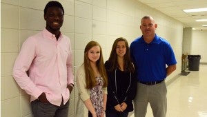 Donovan Ross, Olivia Johnson and Caroline April are on the IT advisory committee for the IT Academy taught by Jason Haithcock. (Reporter photo / Jessa Pease) 