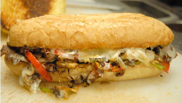The Philly Cheesesteak can be made with either chicken or steak with melted cheese, peppers and onions. (Reporter Photo / Jessa Pease) 