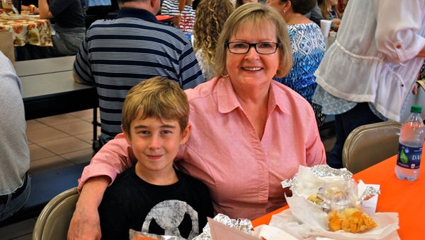 Jack Gilbert and his Mimi, Sherry Gilbert, enjoy lunch together at OMES Grandparents Day on Nov. 6. (Reporter Photo / Molly Davidson)