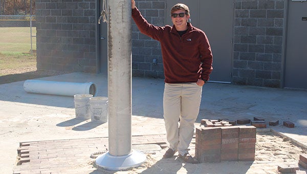 Helena High School senior Connor Romanowski is finishing up his Eagle Scout project of constructing a new flagpole at the HHS baseball stadium. (Reporter Photo/Graham Brooks)
