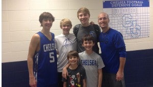 The five Lanzi boys pose for a picture with Chelsea head coach Nicholas Baumbaugh. (Contributed)
