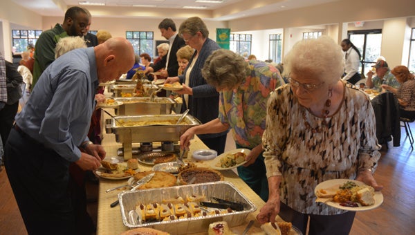 Residents enjoy a traditional holiday meal at the Pelham Senior Center. (Reporter photo / Jessa Pease) 