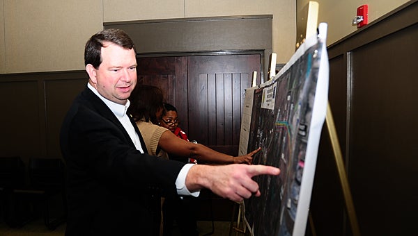 Alabaster resident Rob Richardson looks at a map of a proposed widening project on Alabama 119 during a Dec. 3 public input session on the project. (Reporter Photo/Neal Wagner)