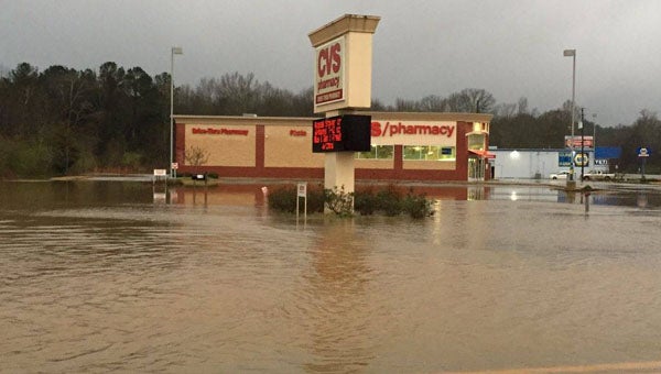 Heavy rain brought flooding to parts of Columbiana and other areas in Shelby County on Christmas day. The CVS parking lot in Columbiana was among the affected areas. (Contributed/Jane McDaniel)