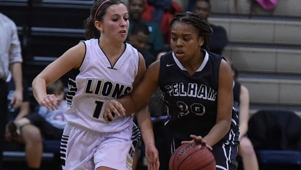 Pelham's Jamila Wilson gets Briarwood's Molly McKenzie on her hip as she drives to the lane on Jan. 5. Briarwood beat the Lady Panthers 53-42. (Contributed / Stephen Schumacher)
