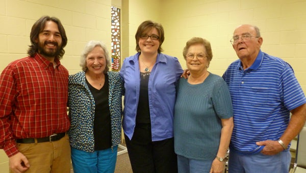 Author Olivia Folmar Ard (center) with her husband John Ard, and grandparents Gayle Folmar Ard, Marie and Bob Hartley at the book signing of her first novel, "The Partition of Africa." (Contributed)