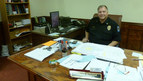 Richard McClelland of Chelsea has been promoted to chief of police at the Childersburg Police Department. He has been in law enforcement for 24 years and with Childersburg since 2011. He also practices at McClelland Law LLC in Columbiana. Pictured is McClelland in his office at the Childersburg Police Department. (Contributed)