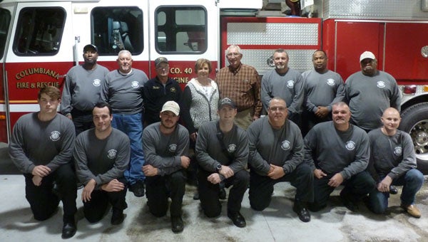 Linda and Evan Major thank the Columbiana Fire Department for their courageous work fighting their house fire on Mildred Street. Front row: Josh Dunnaway, Oliver Head, Cody Shields, Brett Ashworth, Jason Head, Billy Seale, Grady Gentry; and back row: Richard Sutton, Jerry Davidson, Assistant Chief Jerry Lamb, Linda and Evan Major, Chief Johnny Howard and Ronald Reed, Rodney Reed. Not pictured: Kerry Dale Horton, Jared Hanscom, Cory King and Randy Joiner. (Contributed)