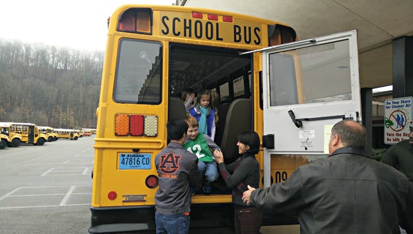 OMES students practice evacuating a school bus as part of research by Yousif Abulhassan, an Auburn University doctoral candidate. (Contributed)