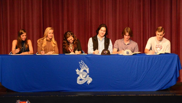 Chelsea High School had six seniors sign with six different schools to play three different sports on Feb. 3. From left they are; McKenzie Bryant, Alex Smithson, Sophie Wilson, Jake Posey, Joel Cheatwood and Markus Frederick. (Reporter Photo / Baker Ellis)