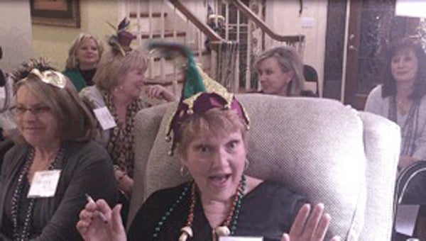 Sharon Hauser models her Mardi Gras Jester hat at a Highland Lakes Women's Club meeting in February. (Contributed)
