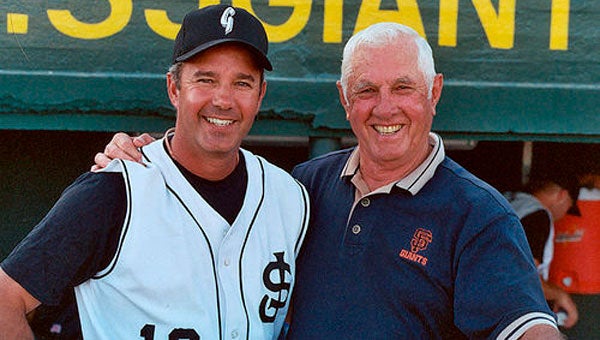 Jim Davenport (right), shown here with his son, Gary, at a San Jose Giants baseball game in 2005, died on Feb. 18 in California. (File)