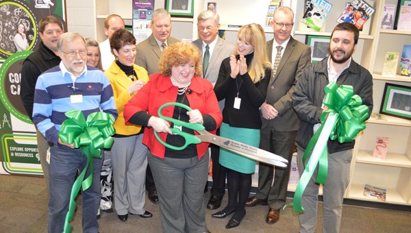 PHS career coach Isabelle Eaton, along with city leaders, school administrators and members of the Greater Shelby Chamber, celebrates the completion of the new Connect2Careers Center. (Reporter photo / Jessa Pease)  
