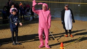 Pelham Mayor Gary Waters displays his pink bunny suit for the Polar Plunge costume contest. 