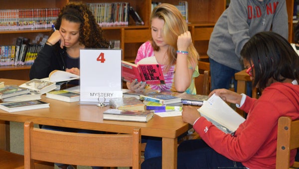 Seventh grade students at Riverchase Middle School participate in a speed dating activity involving six genres of books. (Reporter photo/ Jessa Pease) 