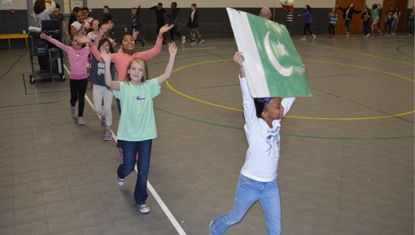 Students at Valley Intermediate School participate in the opening ceremony for the Physical Fitness Olympics. (Reporter photo / Jessa Pease) 