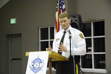 Shelby County Sheriff's Office Chief Deputy Chris George speaks to the COP and others gathered at the group's awards dinner Feb. 23. (Reporter Photo/Emily Sparacino)