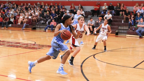 Calera's Tyesha Haynes averaged 20 points, 6.1 rebounds and 4.1 assists per game in her senior season for the Lady Eagles, and is the Player of the Year in Shelby County. (File)