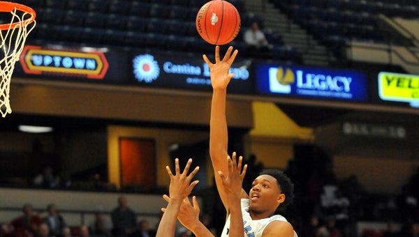Austin Wiley goes up for two points in Spain Park's 63-61 overtime loss to Central-Phenix City in the 7A Final Four on March 3. (Contributed / Ted Melton)