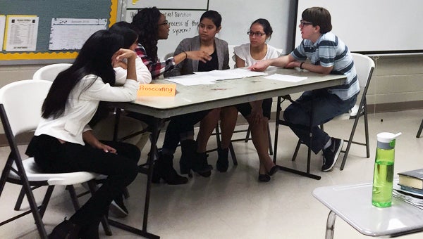 Students in Pelham High School’s law academy participate in a mock murder trail. (Contributed) 