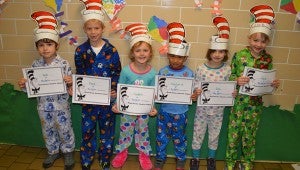 Students in Susan Morton’s kindergarten class receive certificates for participating in Read Across America Week.