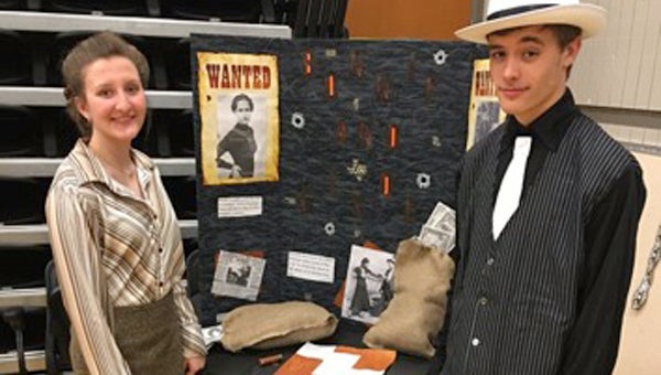 About 80 students from Vincent High School portray historical characters, such as Bonnie and Clyde, on March 21 at the school’s Living History Museum. (Contributed) 