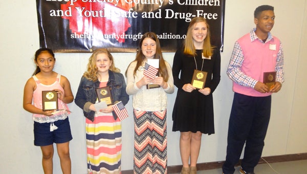 Columbiana area students Chelsea Guerrero, Abigail Rush, Allyson Partridge, Morgan Jeffries and Deon Carter received Character in Action awards at a Shelby County Drug Free Coalition meeting March 16 at Family Connection in Alabaster. (Reporter Photo/Emily Sparacino)