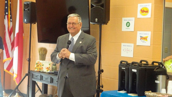 Chelsea Mayor Earl Niven addresses the nearly 100 people gathered in the senior adult wing of the Chelsea Community Center at the South Shelby Chamber's Coffee with the Mayor event on March 10. (Reporter Photo/Emily Sparacino)