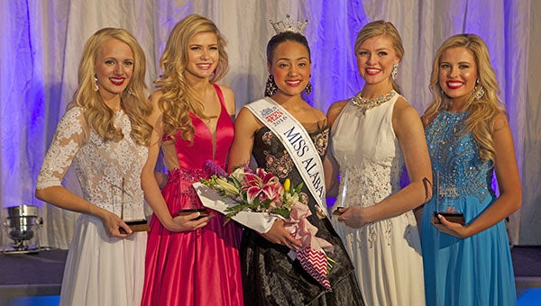 Helena’s Tiara Pennington, center, was crowned Miss Alabama’s Outstanding Teen 2016. Pennington received a total of $186,780 in scholarships and will represent the state at the Miss America’s Outstanding Teen Pageant in Orlando, Fla. in August. (Contributed)