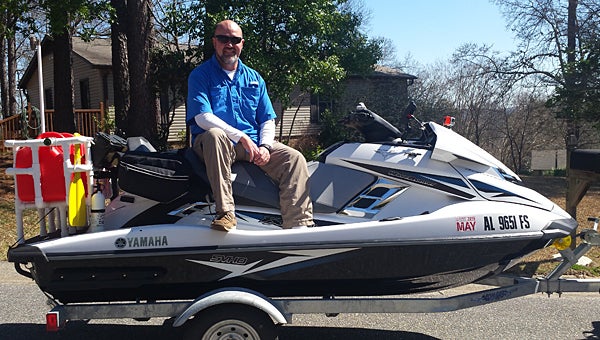 Alabaster resident Scott Housey showcases the Yamaha WaveRunner he will soon ride from central Alabama to Key West and back. (Contributed)