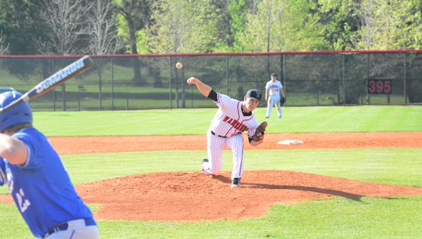 JC Goolsby delivers a pitch during Thompson’s first game against Tuscaloosa County on April 7. The Warriors split the series with the Wildcats, moving to 19-15 on the year. (Reporter Photo / Baker Ellis)
