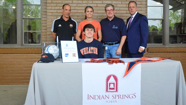 Indian Springs’ Austin Pack, surrounded by his parents, Vestavia Hills Soccer Club Executive Director Rocky Harmon (left) and Indian Springs head boys soccer coach Rik Tozzi (right) signed his letter of intent to play college soccer at Wheaton College on April 14. (Reporter Photo / Baker Ellis)