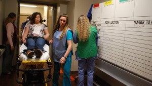 A decontaminated patient, played by a Jeff State student, is brought into the Grandview emergency room. (Reporter Photo/Molly Davidson)