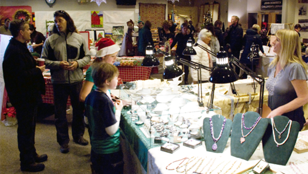 Attendees of Lori Gulledge’s Christmas bazaar peruse various items and vendors. (Contributed)  