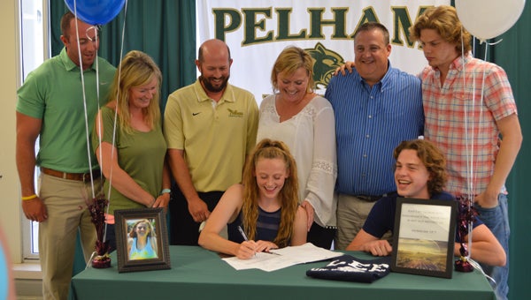 Pelham High School’s Jordan Allison commits to run track at Lee University at a May 10 signing ceremony. (Reporter photo/Jessa Pease) 