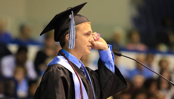 Spain Park High School senior class president Andrew Perry talks about his inspiration during a speech at the Spain Park class of 2016 graduation on May 25. (For the Reporter/Dawn Harrison)
