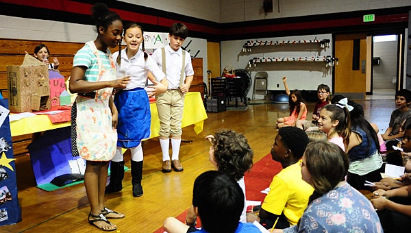 Thompson Intermediate School fifth-graders explain European culture to the school’s fourth-graders during multicultural day on May 18. (Reporter Photo/Neal Wagner)