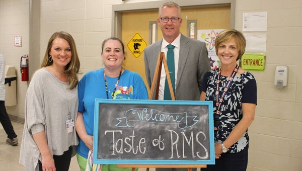 Riverchase Middle School’s Child Nutrition Program and Superintendent Dr. Scott Coefield celebrate at the second annual Taste of RMS. (Contributed) 
