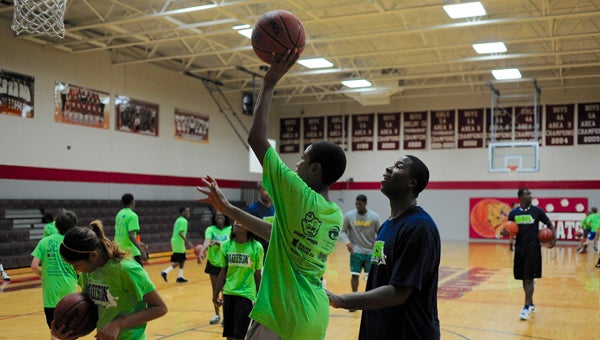 Bobby Madison, shown here at his camp in 2013, will host his seventh annual basketball camp running from June 27-20 at Columbiana Middle School. (File)