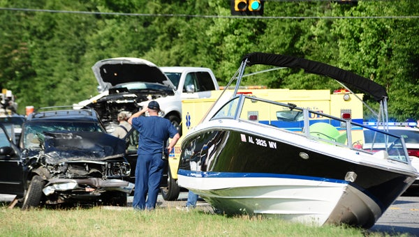Minor injuries were reported from a crash involving a Dodge pick-up truck pulling a boat and a Ford Explorer at the intersection of Alabama 25 and Shelby County 47 in Columbiana on the afternoon of June 24. (Reporter Photo/Emily Sparacino)