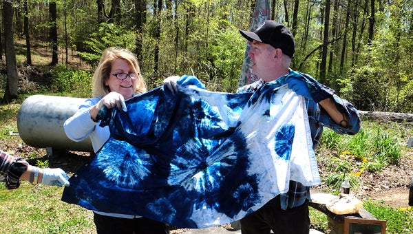Mary Gibson literally took the shirt off her back to try out an indigo dyeing process demonstrated by Doug Baulos at a recent workshop held in Helena. Check out the feature article in the May issue of Shelby Living. (Contributed)