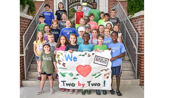 HES first and second grade peer helpers helped raise $500 for Two by Two Rescue and participated in numerous other activities throughout the school year. (Contributed)