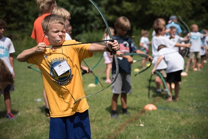 Cole Wilson participates in archery.