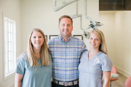 The Oak Mountain Pediatric Dentistry staff includes hygienist Stephanie Garrett, Dr. Jeff Flannery and office manager Madeline Patterson.