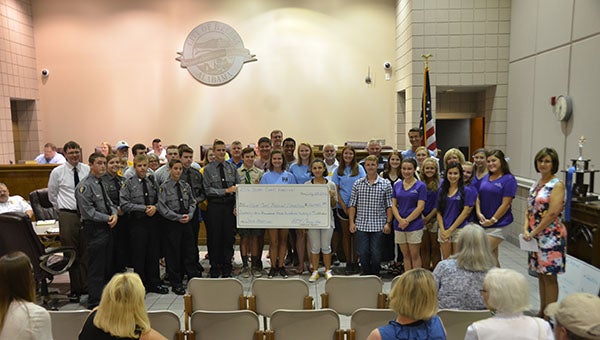 Pictured are all the Helena organizations that received a donation from the Buck Creek Festival totals at the July 25 Helena City Council meeting. (Reporter Photo/Graham Brooks)