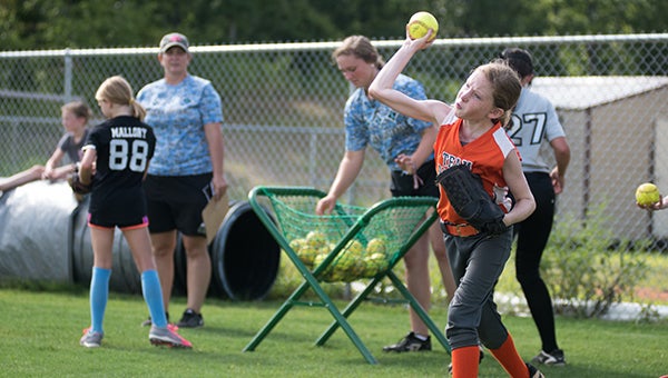 Eighteen kids signed up for the Helena Huskies youth softball camp and participated in numerous drills July 12-13. (Reporter Photo/Keith McCoy)