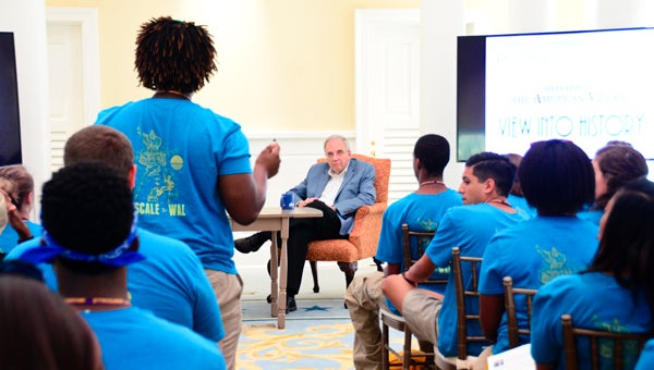 A student asks American Village founder and CEO Tom Walker a question during the "View Into History" show June 24 as part of the 2016 Walsh Academy of Leadership. (Reporter Photo/Emily Sparacino)