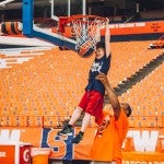 11-year-old Gabe Griffin had a memorable trip, including slam dunking a basketball with the help of the Syracuse University hoops team.